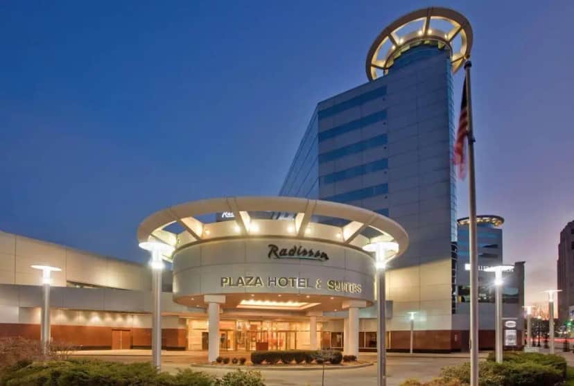a plaza hotel and suites with a building at Radisson Plaza Hotel at Kalamazoo Center in Kalamazoo
