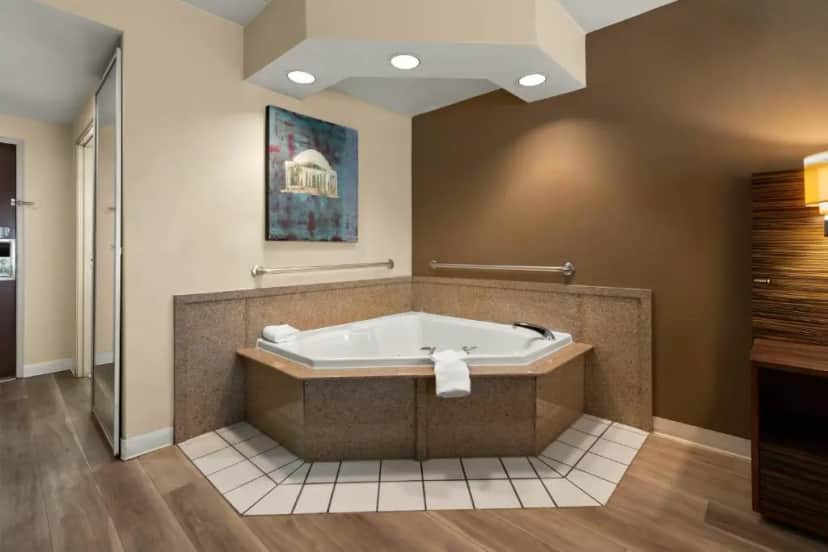 Private in-room jacuzzi tub in the King Room with Hot Tub - Non-Smoking at Ramada by Wyndham Harrisburg/Hershey Area