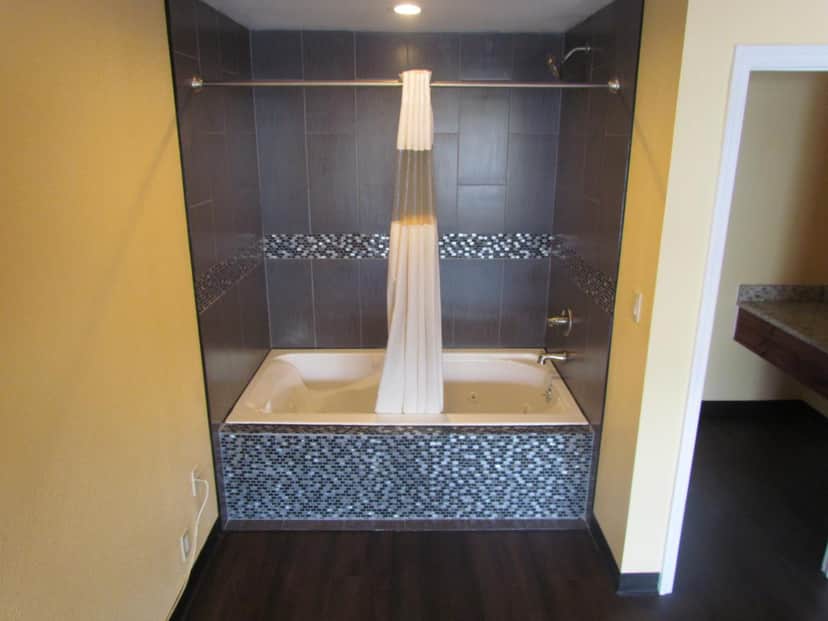 Private in-room jacuzzi tub at Red Carpet Inn Gorden Hwy Augusta