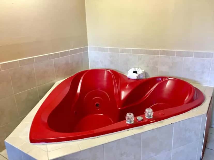 In-room hot tub at Red Carpet Inn Stamford in Stamford, CT