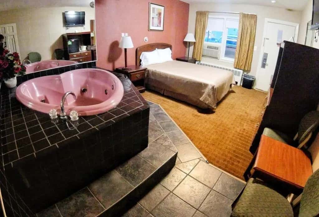 Private in-room jacuzzi at Red Carpet Inn West Springfield
