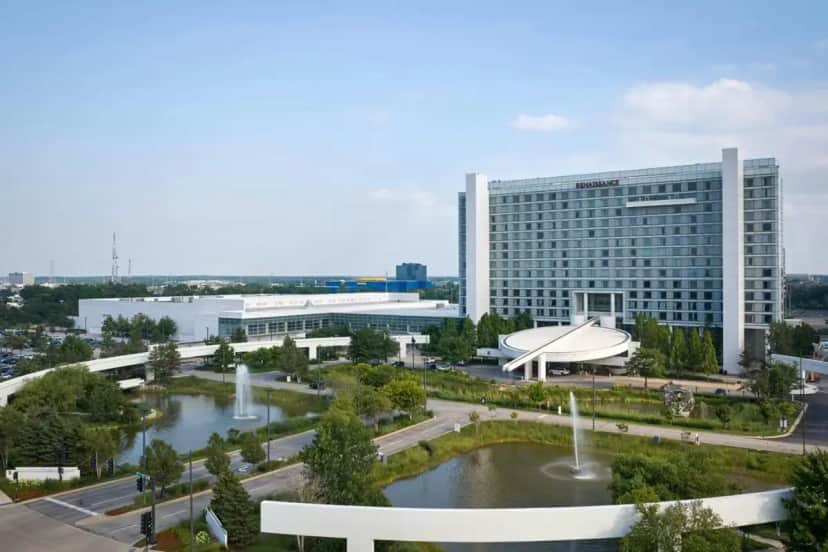 a large building with a fountain in front of it at Renaissance Schaumburg Convention Center Hotel in Schaumburg