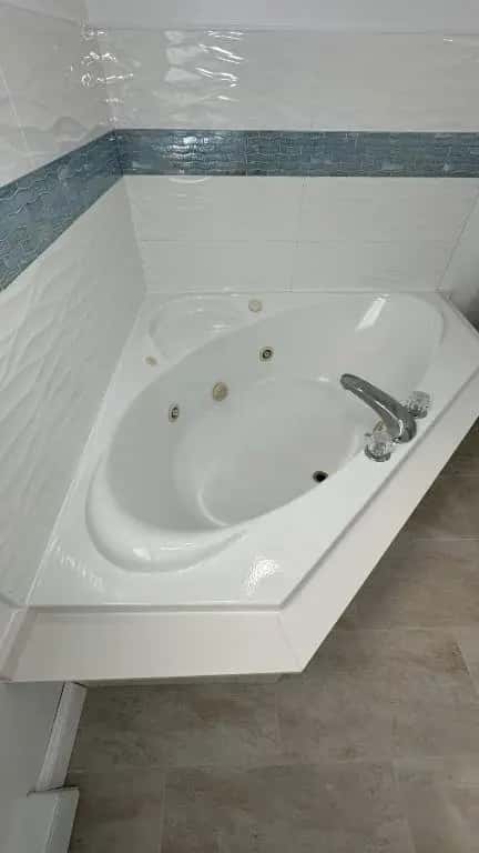 In-room hot tub at Rhea’s Inn by the Sea in Middletown, RI