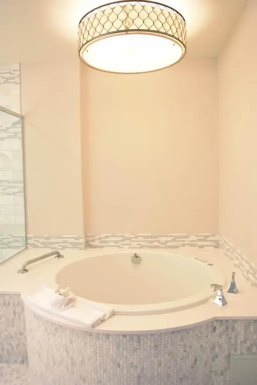 Private in-room jacuzzi tub in the Grand Master Suite at Rhythm City Casino Resort