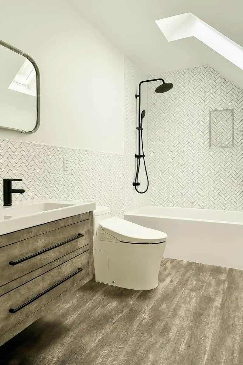a bathroom with a toilet and a sink and a shower at River Front Home Good for Family and Groups in East Haddam