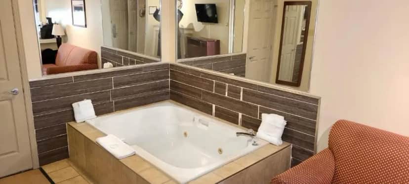 Private in-room jacuzzi in the Deluxe Suite with Spa Bath at Riviera Inn And Suites 1000 Islands
