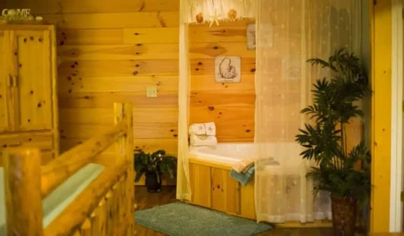 In-room hot tub at Romantic Jacuzzi Cabin Suite in OH, OH