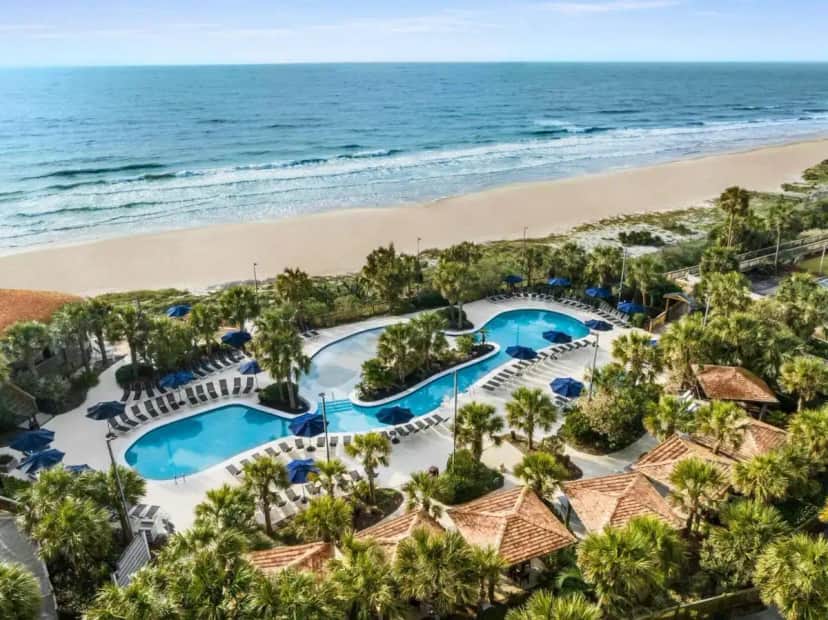 an aerial view of the pool and beach at the resort at Royale Palms Condominiums in Myrtle Beach
