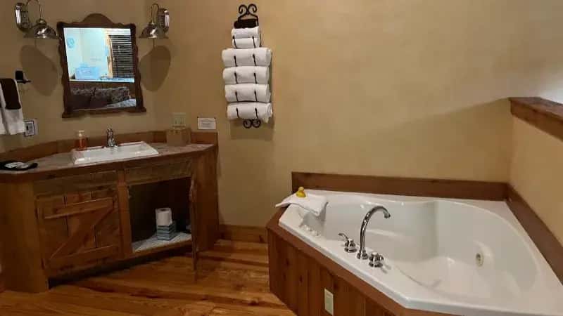 In-room hot tub at Ruidoso Lodge Cabin in Ruidoso, NM