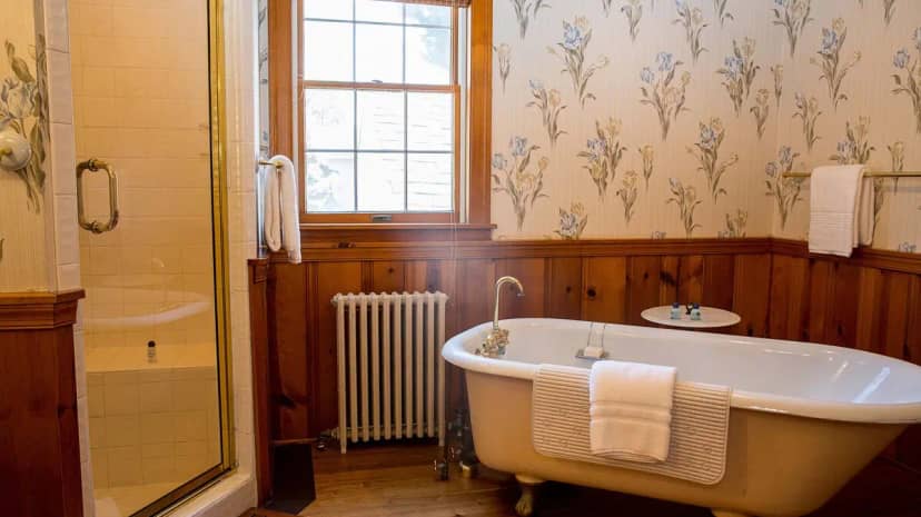 Deep soaking bathtub for the Deluxe Waterfront Suite with Porch (1st Floor) at Sandaway Suites & Beach