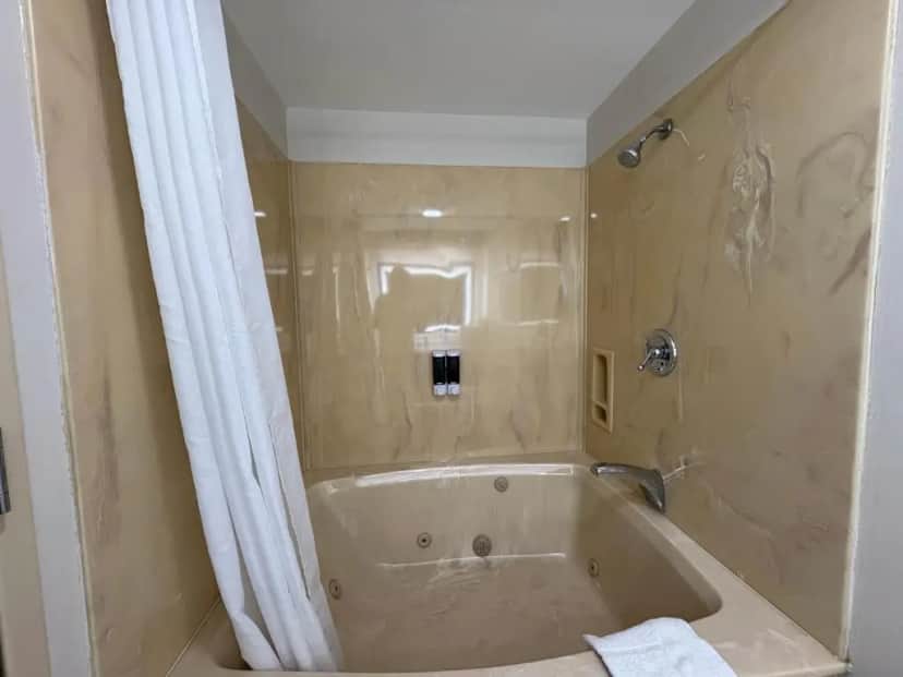 Private in-room jacuzzi tub in the King Room with Spa Bath at Sandusky Inn