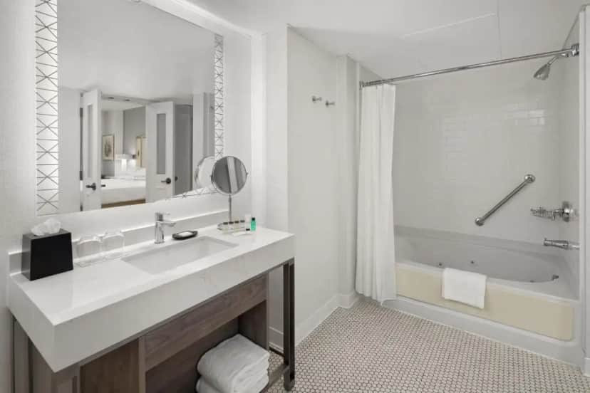 Private in-room jacuzzi tub in the Club level, Suite, 1 King, Sofa bed, Lake view, High floor at Sheraton Duluth Hotel