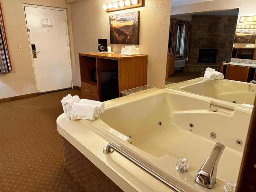 Private in-room jacuzzi in the King Suite with Spa Bath - No Pets at Sidney James Mountain Lodge