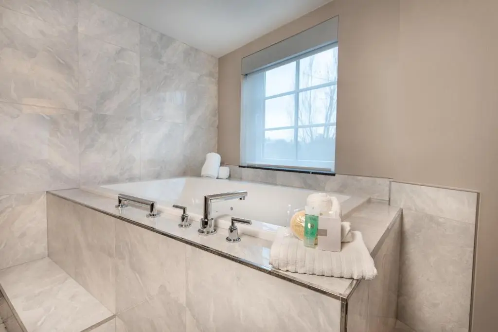 Private in-room jacuzzi tub in the King Room with Whirlpool at Silver Cloud Hotel - Seattle Broadway