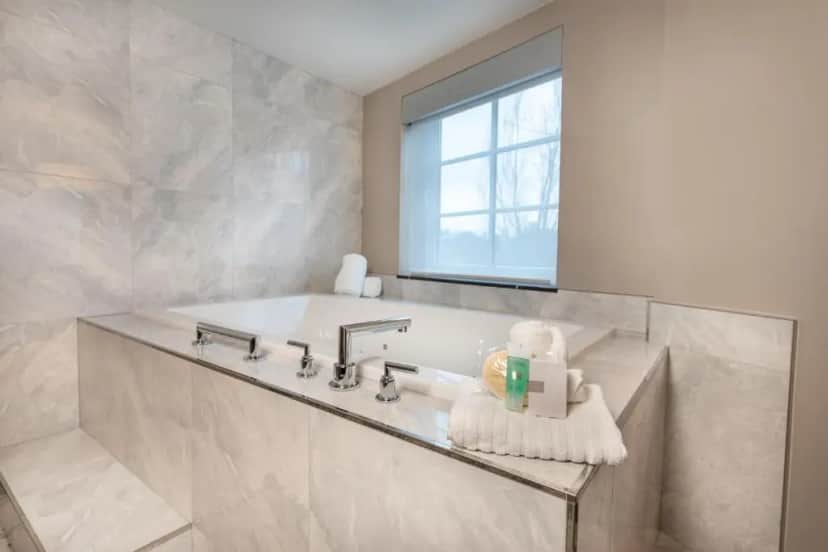 Private in-room jacuzzi tub in the King Room with Whirlpool at Silver Cloud Hotel - Seattle Broadway