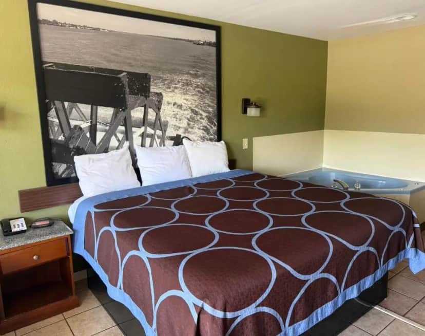 Private in-room jacuzzi tub in the King Suite with Spa Bath at Staywell Suites