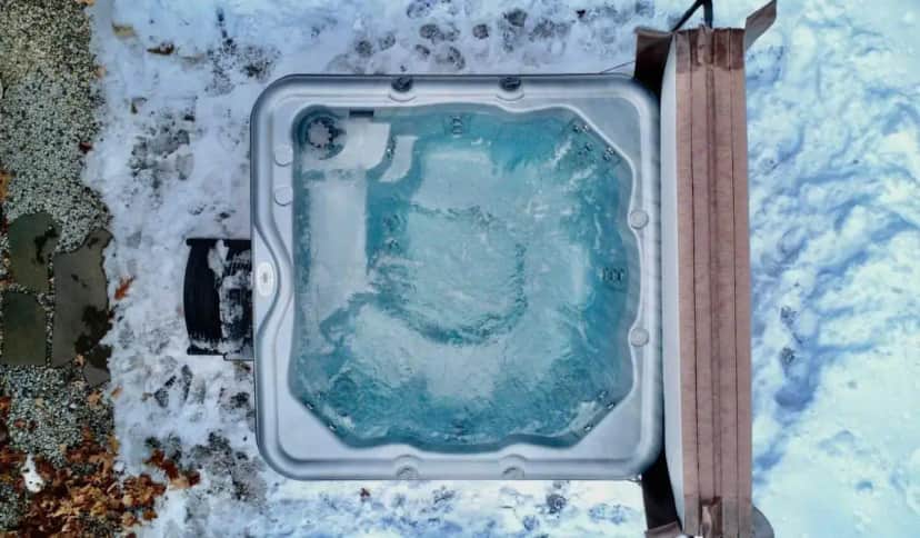 a swimming pool with snow on the ground at Strasse Ski Chalet Hot Tub Dog-Friendly Skiing in Bartlett