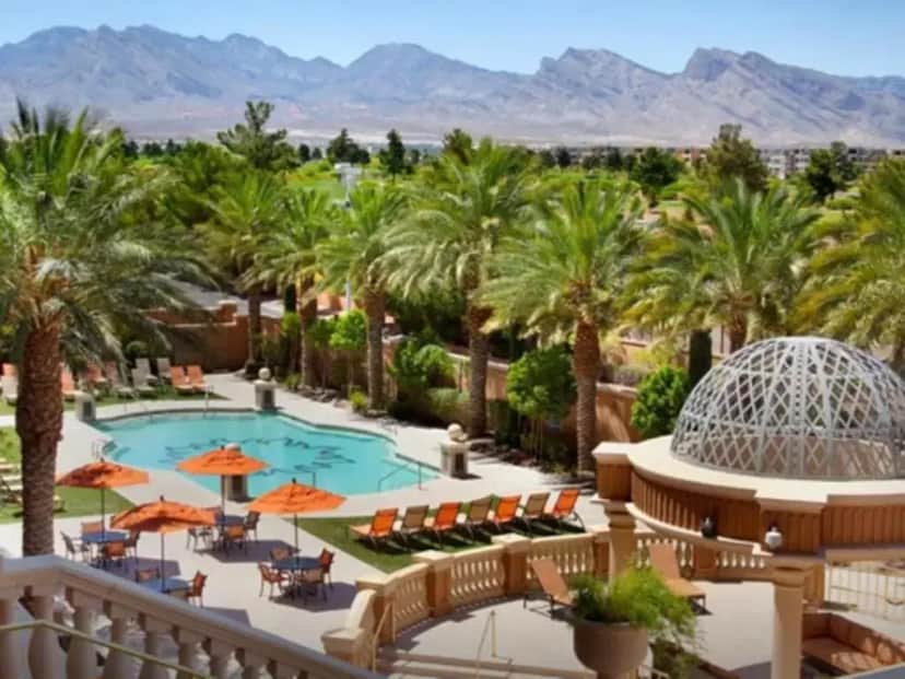a view of a resort with a pool and palm trees at Suncoast Hotel and Casino in Las Vegas