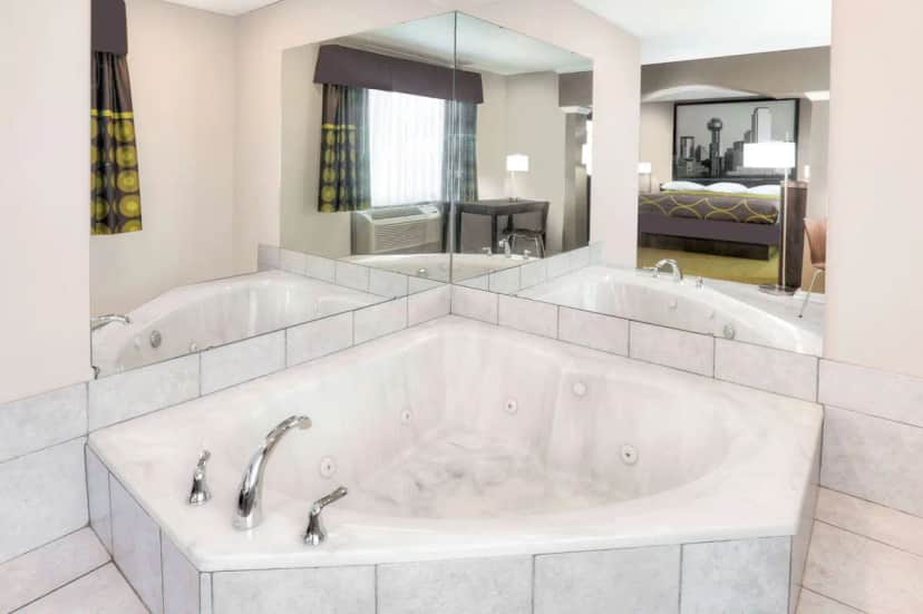Private in-room jacuzzi tub at Super 8 by Wyndham Bedford DFW Airport West