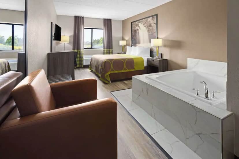 Private in-room jacuzzi tub in the Deluxe Studio Suite, 1 King Bed, Non Smoking, Hot Tub at Super 8 by Wyndham Henrietta / Rochester Area