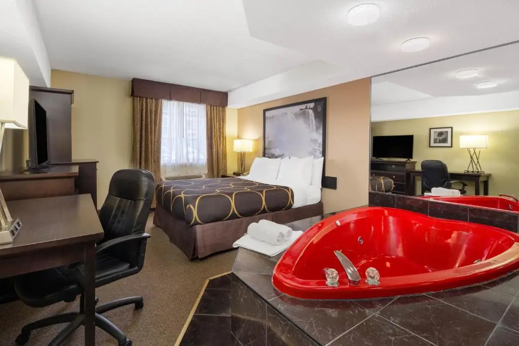 Private in-room jacuzzi in the Deluxe King Room - Non-Smoking at Super 8 by Wyndham Niagara Falls NY