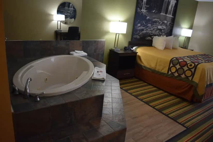 Private in-room jacuzzi tub in the Suite, 1 King Bed, Non Smoking at Super 8 by Wyndham Paragould