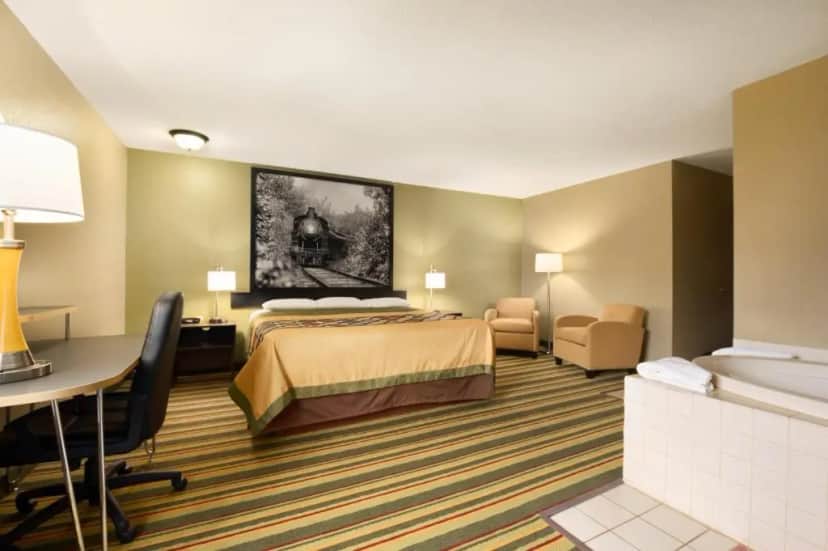 Private in-room jacuzzi tub in the Deluxe King Studio Suite - Non-Smoking at Super 8 by Wyndham Rantoul