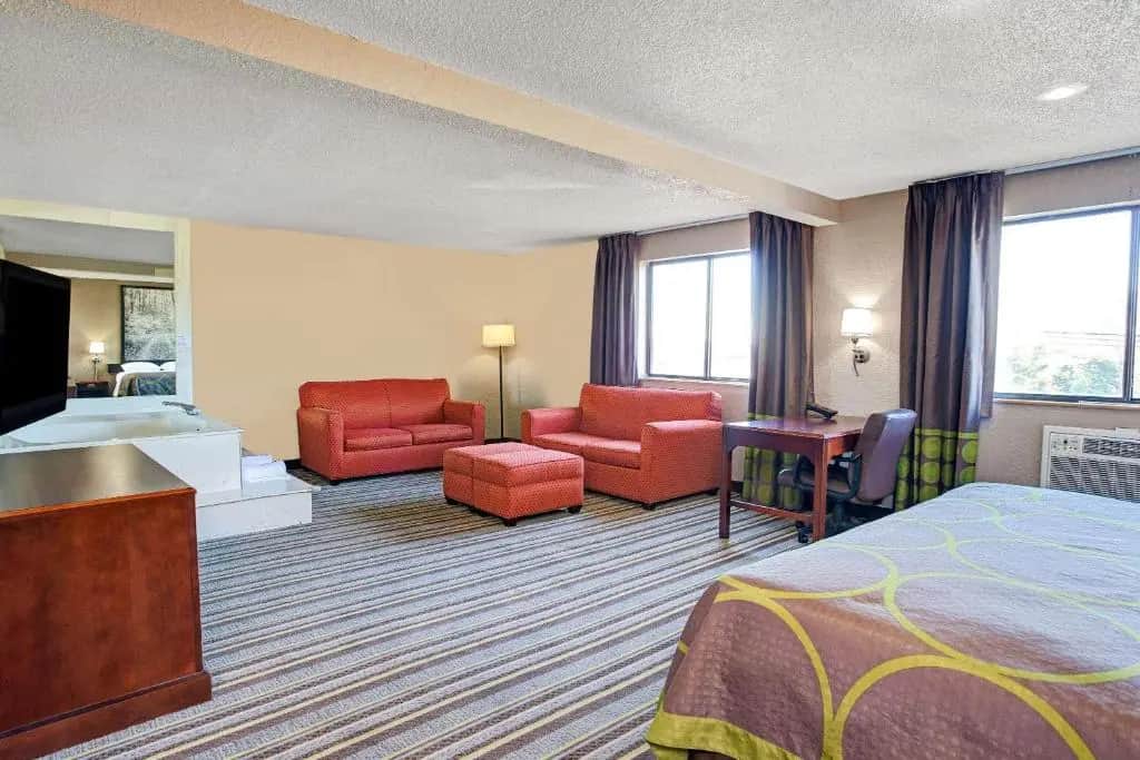 Private in-room jacuzzi in the Deluxe King Suite at Super 8 by Wyndham Roseville/Detroit Area