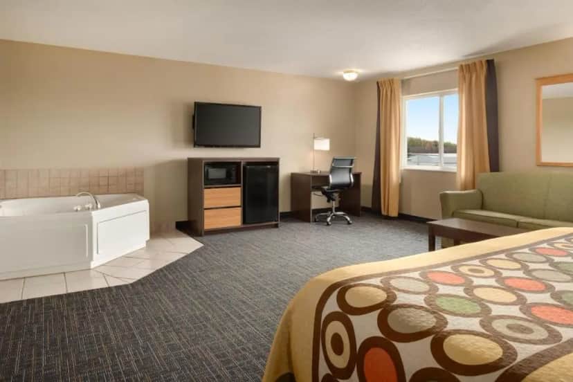 Private in-room jacuzzi tub in the King Studio Suite - Non-Smoking at Super 8 by Wyndham Sioux Falls