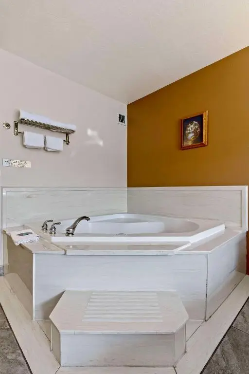 Private in-room jacuzzi tub in the King Suite with Walk-In Shower and Jetted Tub at Surestay By Best Western Twin Falls