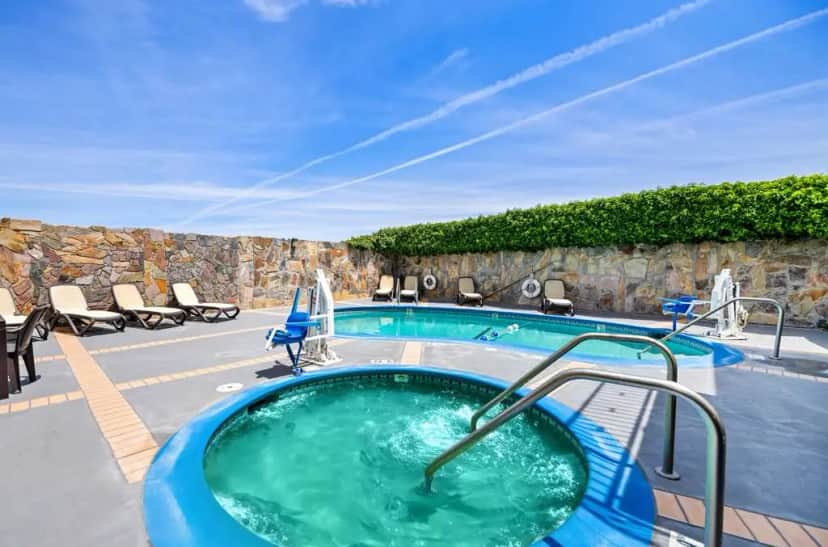 Shared outdoor hot tub at SureStay Plus Hotel by Best Western San Jose Central City