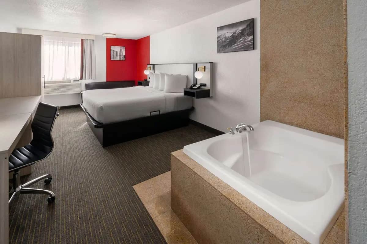 Private in-room jacuzzi at SYLO Hotel Denver Airport, a Ramada by Wyndham