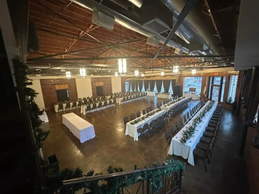 an overhead view of a banquet hall with tables and chairs at The Campbell Hotel in Tulsa