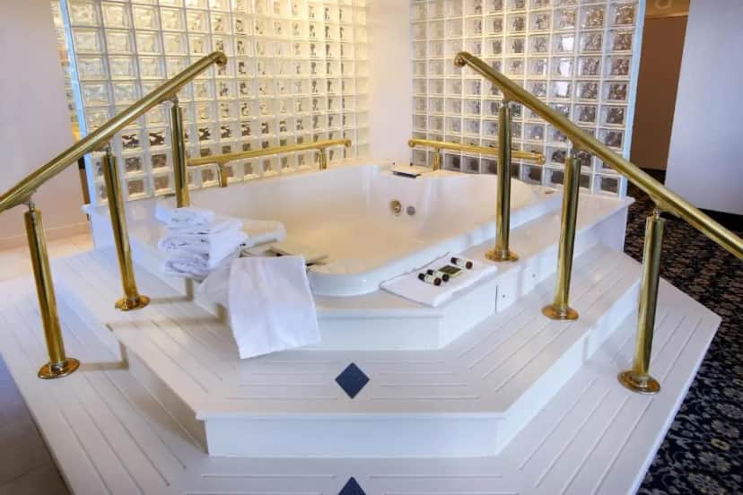 Private in-room jacuzzi tub in the Gatsby Whirlpool King at The Claridge Hotel