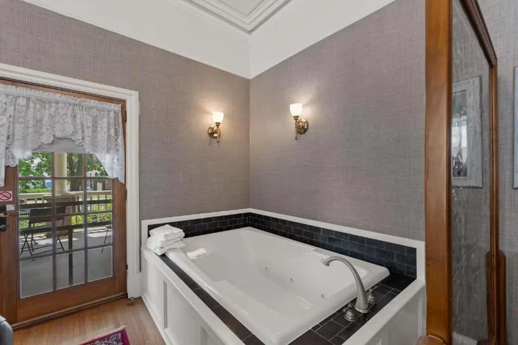 Private in-room jacuzzi tub in the Deluxe King Suite at The Foxglove Inn