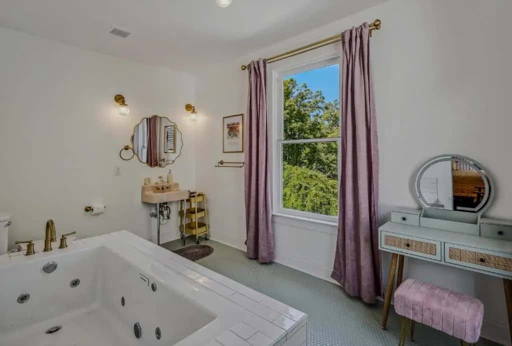 Private in-room jacuzzi tub in the King Room with Spa Bath at The Grand Castalian Inn Bed And Breakfast