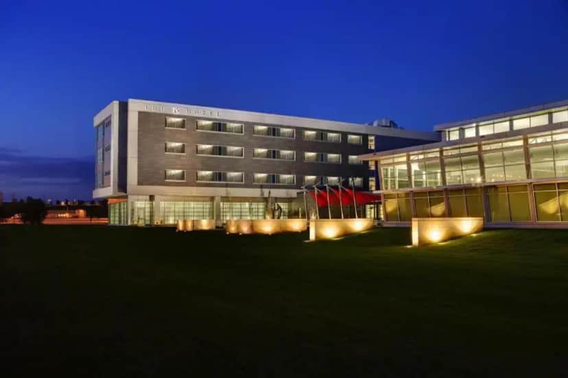 a large building with lights in front of it at THE HOTEL AT KIRKWOOD CENTER in Cedar Rapids