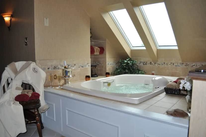 Private in-room jacuzzi in the Luxury Suite, 1 King Bed, Non Smoking, Fireplace, Jetted Tub at The Inn & Spa at Intercourse Village