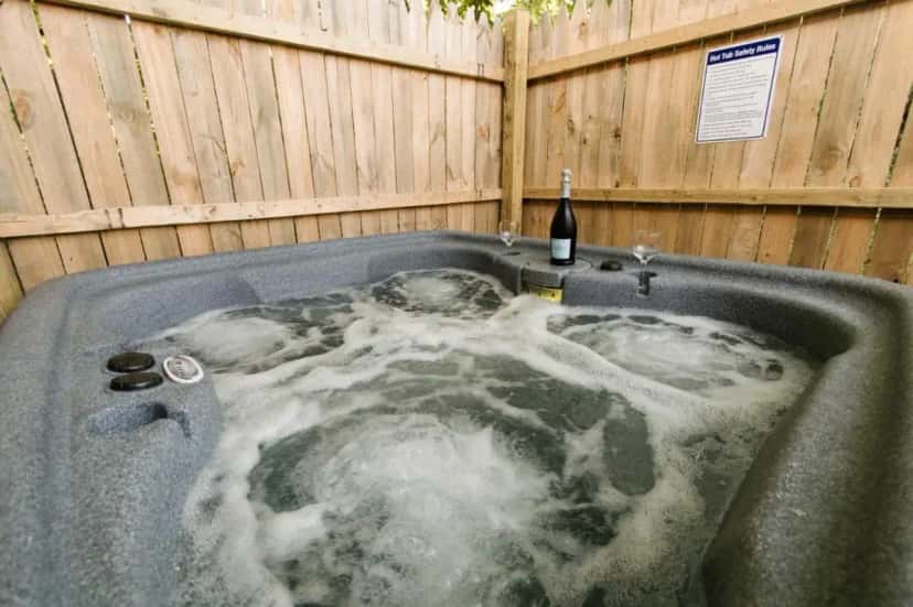 Private outdoor hot tub at The Outpost in Kuttawa, KY