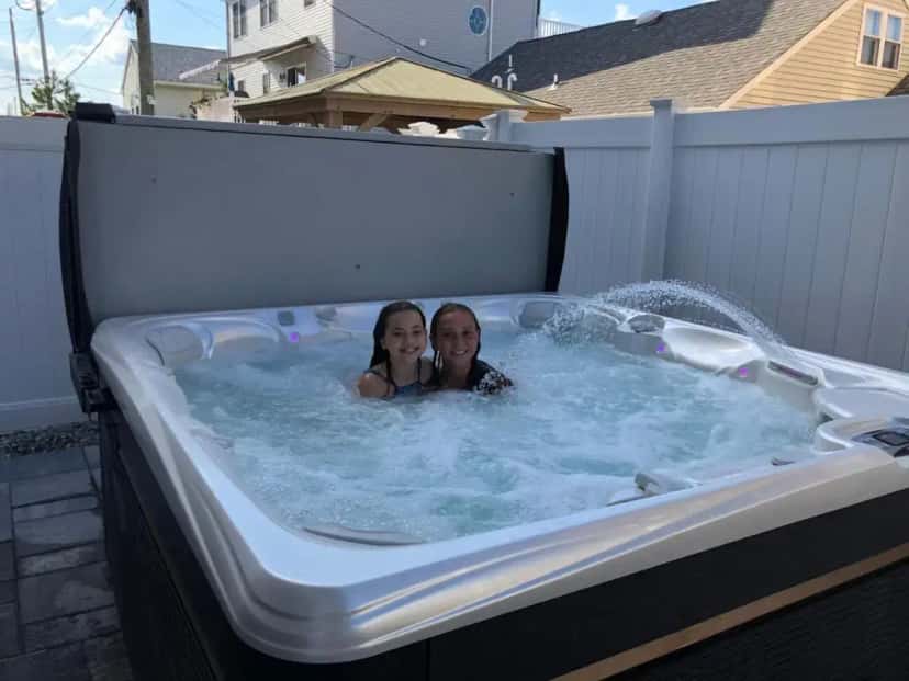Private outdoor hot tub at The Royal Treat in Farmingdale, NY