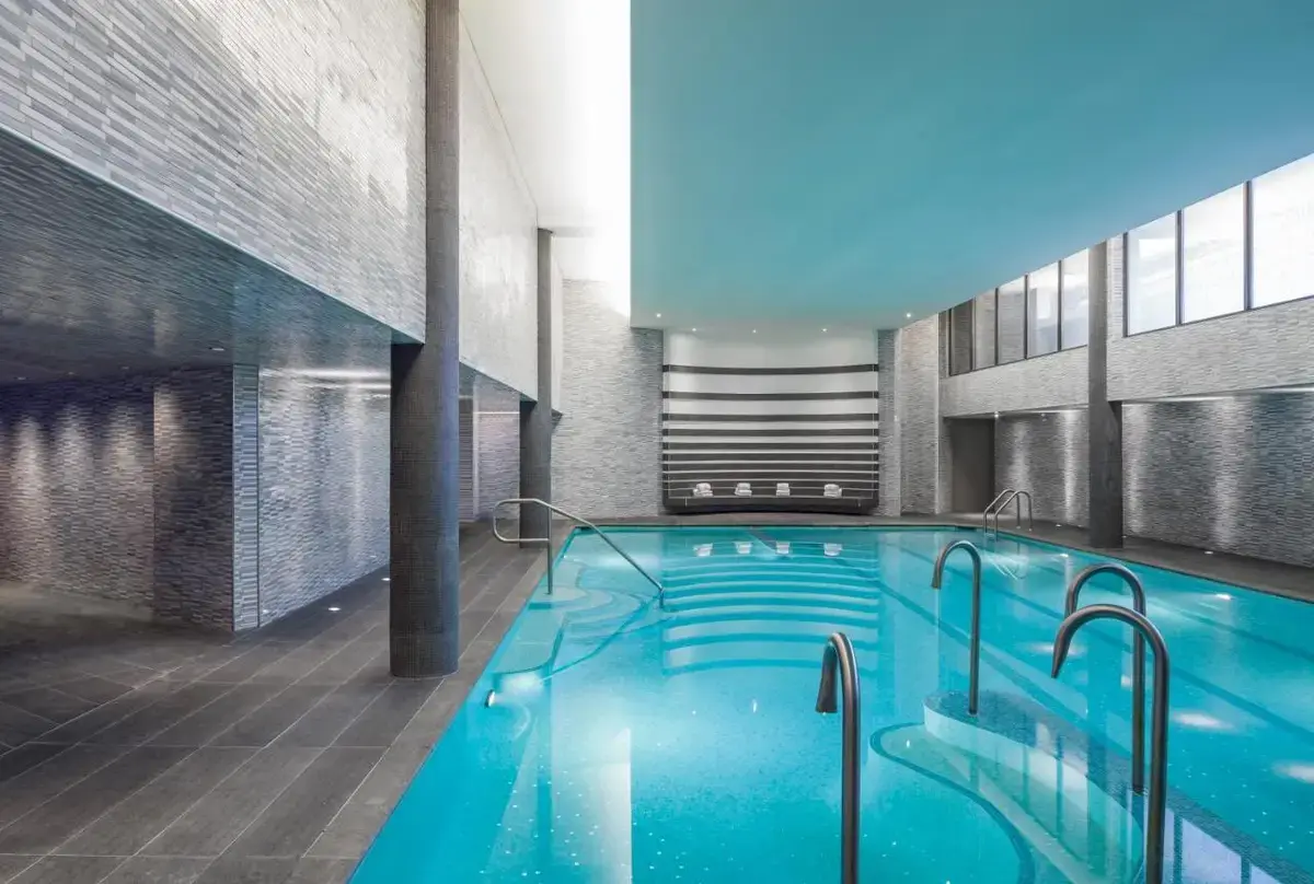 a large swimming pool in a building at The Watergate Hotel Georgetown in Washington, D.C.
