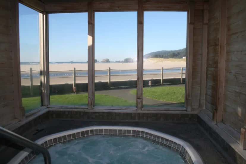 Private outdoor hot tub at The Waves in Cannon Beach, OR