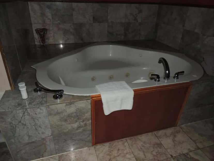 In-room hot tub at The Whispering Pines Inn in Norman, OK