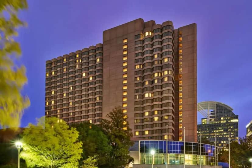 a tall building with lights in front of it at The Whitley, a Luxury Collection Hotel, Atlanta Buckhead in Atlanta