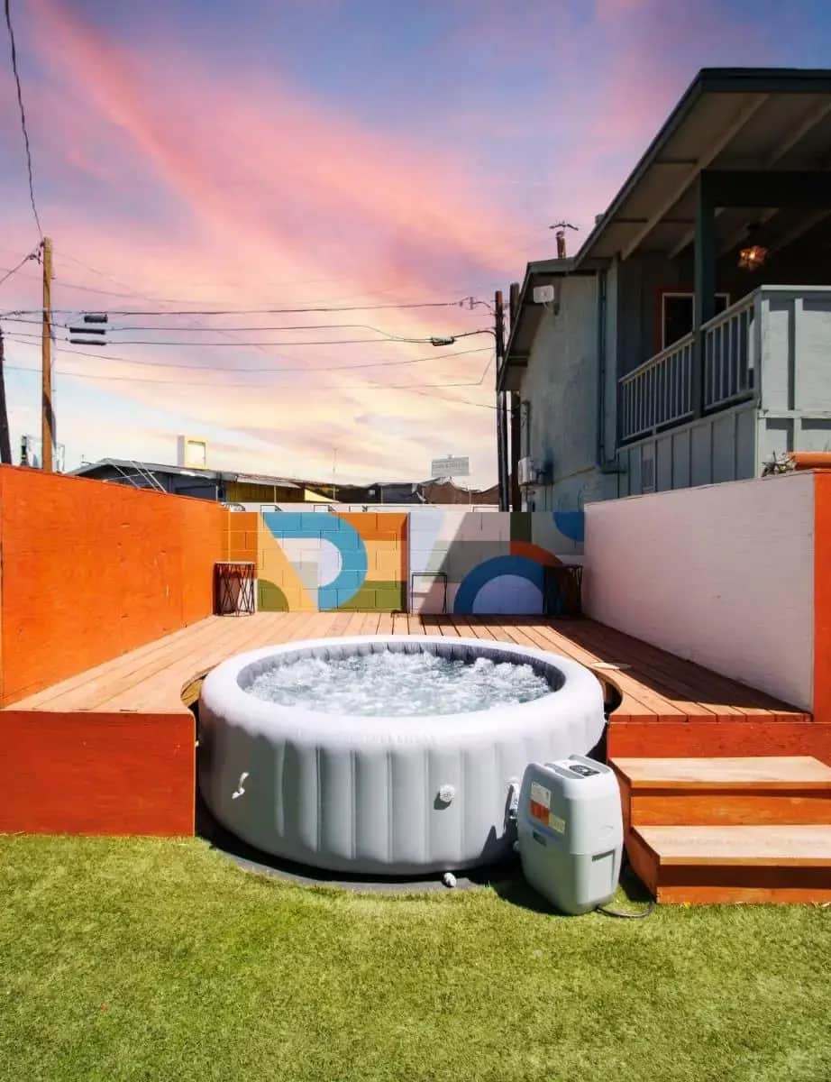 a hot tub in the yard of a house at Unique*NEW*Hot Tub Studio*Mins to DT & PHX Airport in Phoenix