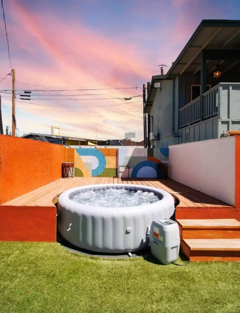 a hot tub in the yard of a house at Unique*NEW*Hot Tub Studio*Mins to DT & PHX Airport in Phoenix