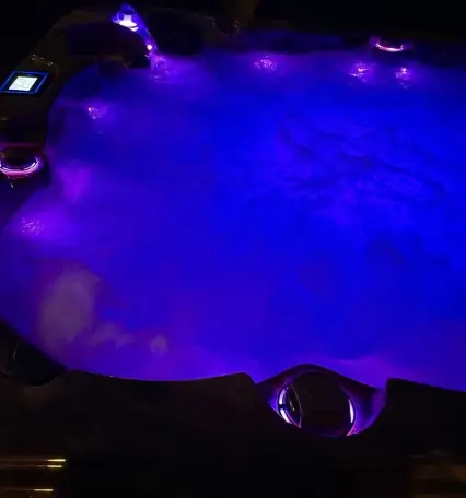 Shared outdoor hot tub at Uptown Watervliet in NY, NY