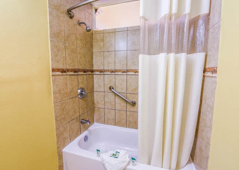 Deep soaking bathtub at Vagabond Inn Hotels