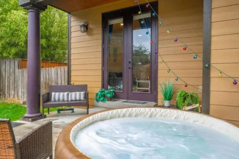 a hot tub outside of a house at Villa Luna in Gig Harbor