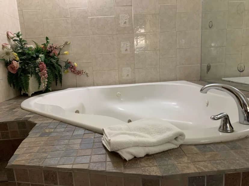 Private in-room jacuzzi tub at Virginia Inn